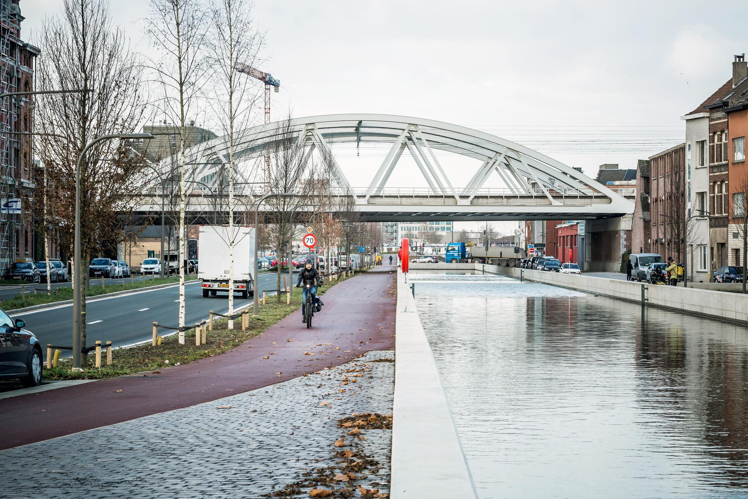 De vernieuwde IJzerlaan met een breed dubbelrichtingsfietspad en opnieuw een kanaal.